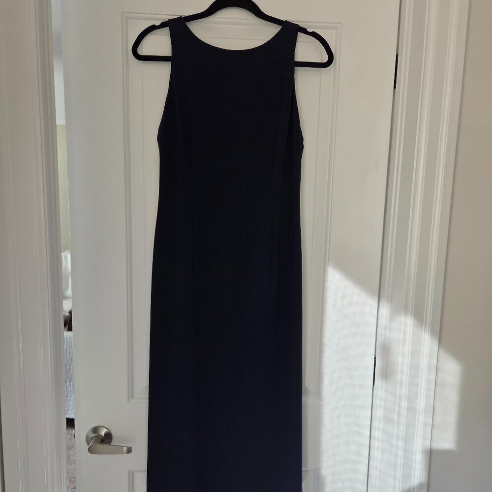 Formal long navy blue sleeveless dress with open back. Size 6